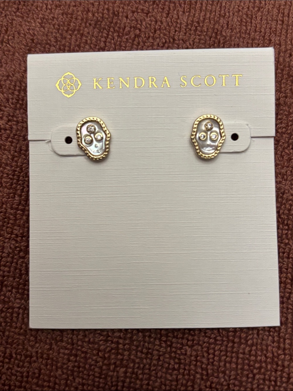 Kendra Scott Gold and White Skull Stud Earrings with Crystal Accents